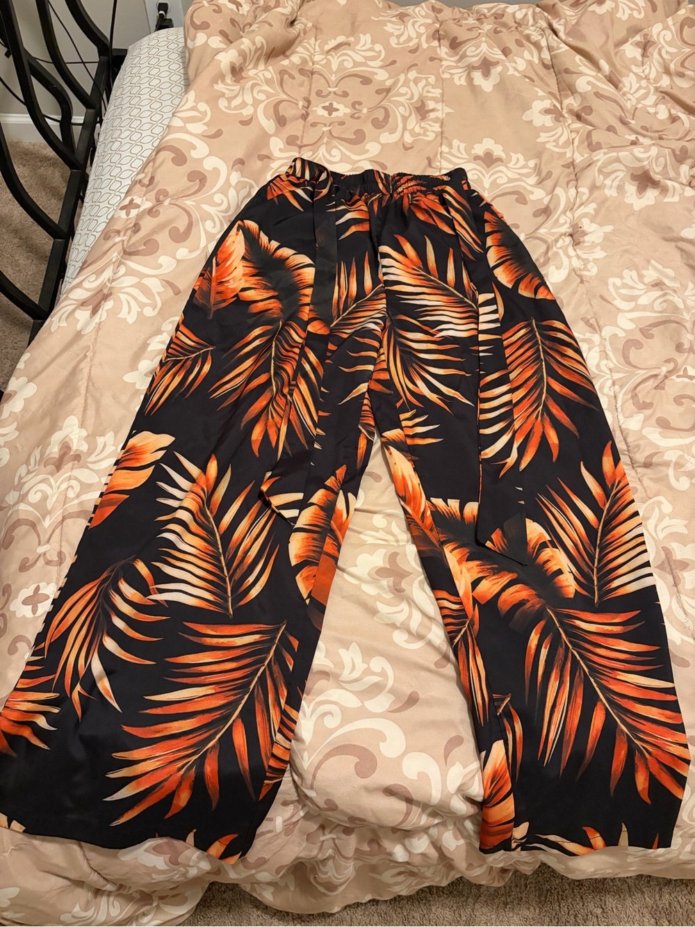 SHEIN Black Wide-Leg Pants with Orange Tropical Leaf Print